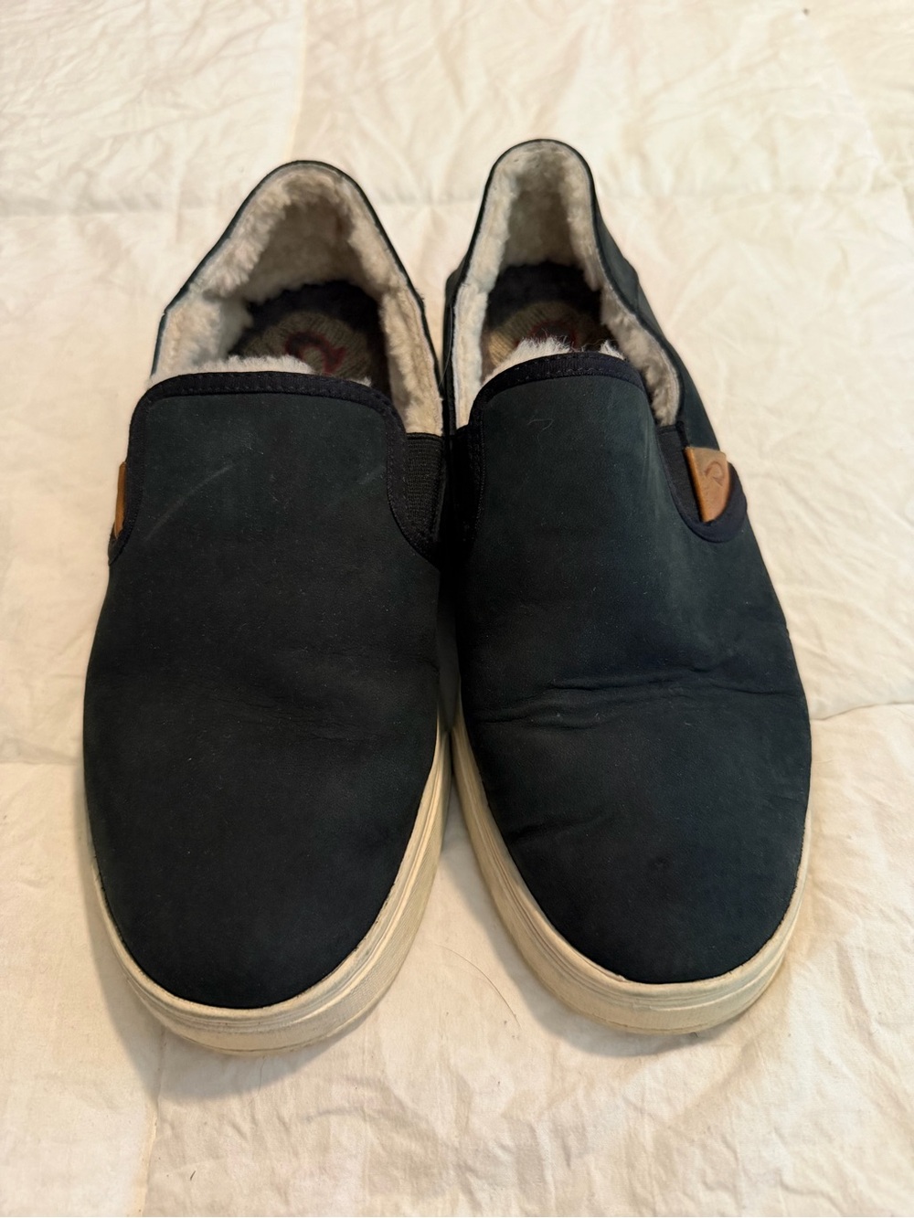 OluKai Women's Slip-On Loafers in Black with Fuzzy Lining